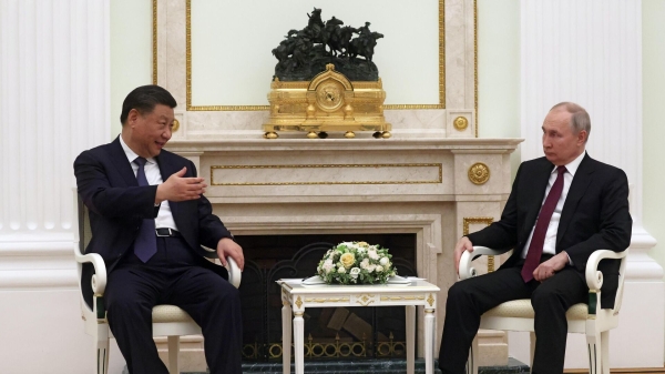Президент России Владимир Путин и председатель Китайской Народной Республики Си Цзиньпин (слева) во время встречи1